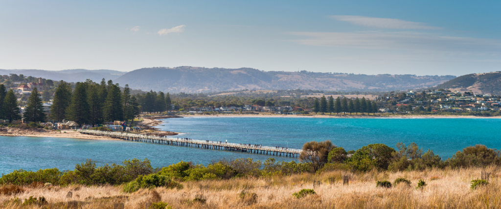 Trent's Plumbing & Gas is pleased to be your local Victor Harbor plumber and we just love this view from Granite Island overlooking the causeway with the Norfolk Island Pines along the shoreline and the hills in the background.